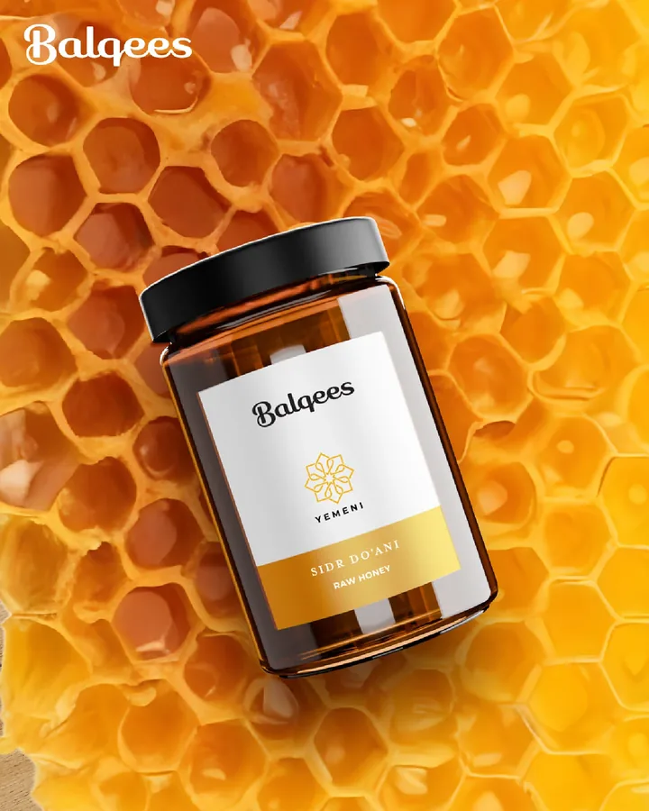 Balqees Yemeni Sidr Do'ani raw honey jar lying on golden honeycomb, Instagram post design